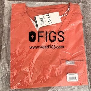 Figs Hot Coral Zamora joggers pants and catarina one-poket scrub top.